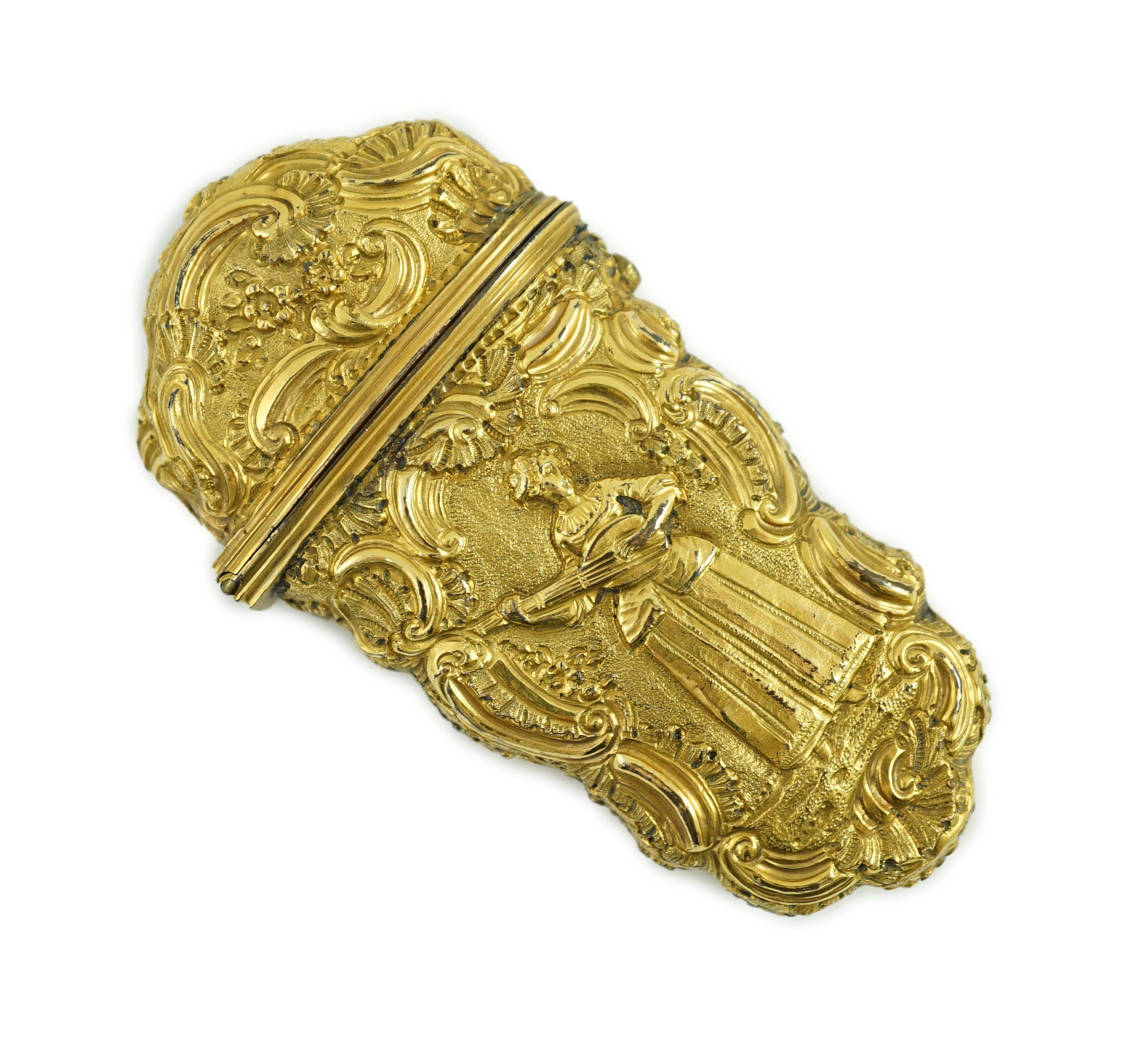 A George III gilt metal etui containing accessories, 10cms high.